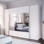 Armadio Callia con 2 ante battenti colore bianco e 2 ante scorrevoli con specchio 270.3x61.2xH210.5 cm.
