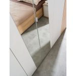 Camere da letto Fadri colore calce grigio chiaro e rovere miele
