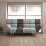 Divano letto Dube con braccioli pieghevoli in tessuto patchwork