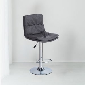 Sgabello Paco con seduta in ecopelle grigio e gamba in metallo inox