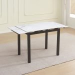 Tavolo allungabile Kyoto con piano in ceramica effetto marmo bianco lucido e struttura in metallo nero