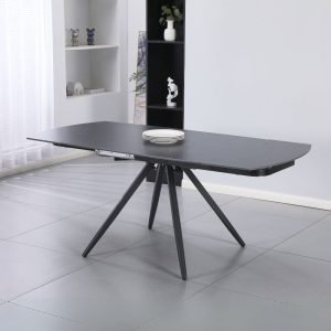 Tavolo girevole allungabile Kitti con piano in ceramica nero opaco e gambe in metallo nero