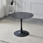 Tavolo rotondo Dot con piano in ceramica effetto marmo nero opaco con particolari oro e gamba nera