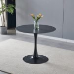 Tavolo rotondo Dot con piano in ceramica effetto marmo nero opaco con particolari oro e gamba nera