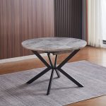 Tavolo rotondo allungabile Evelina con piano in ceramica effetto marmo bianco lucido