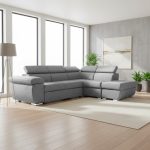 Divano letto Fiona angolare con penisola destra e pouf contenitore in tessuto Aragon 83 grigio